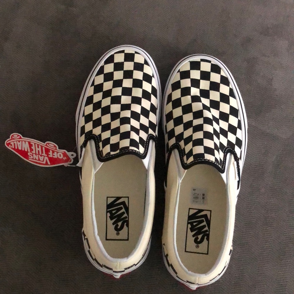 Classic slip-on black and white checkered Vans